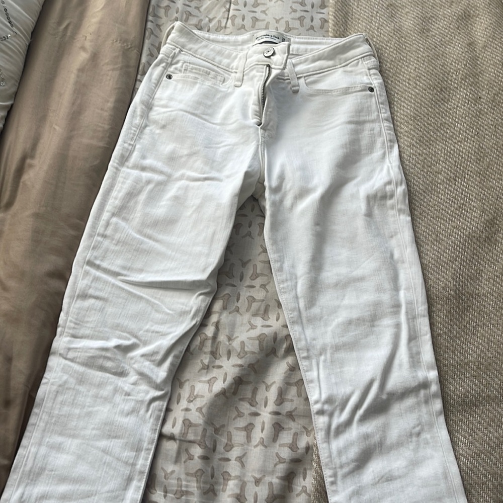 Abercrombie and Fitch, midrise super skinny jeans in white.